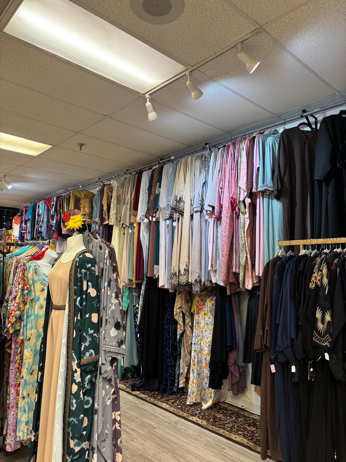 Z Collection store interior with abayas on display